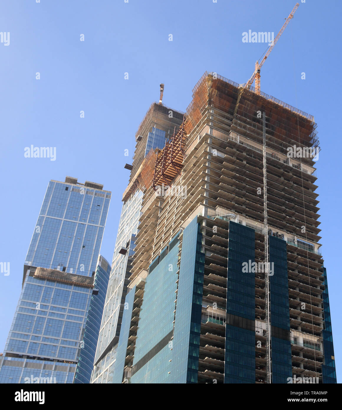 skyscraper develop on sky background at day Stock Photo - Alamy