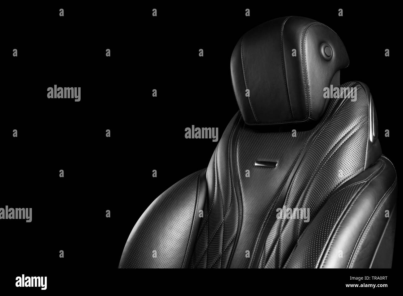 Black leather interior of the luxury modern car. Perforated leather comfortable seats with Black leather interior of the luxury modern car. Perforated leather comfortable seats with