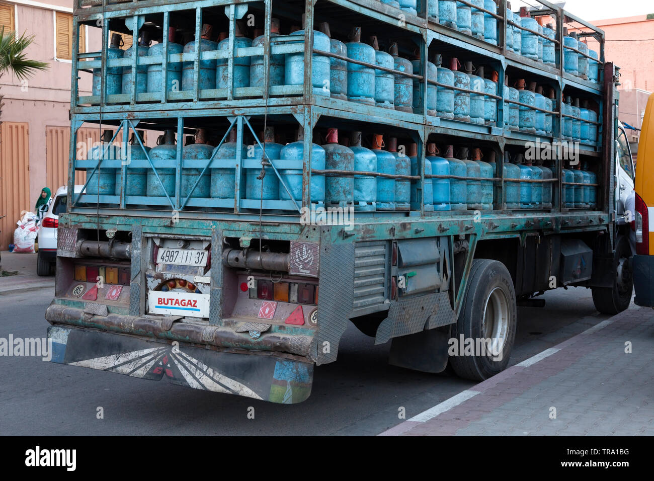 A delivery truck with many Butagaz blue butane gas cylinders. Tafraoute,  Tiznit Province, Souss-Massa, Morocco, Africa Stock Photo - Alamy