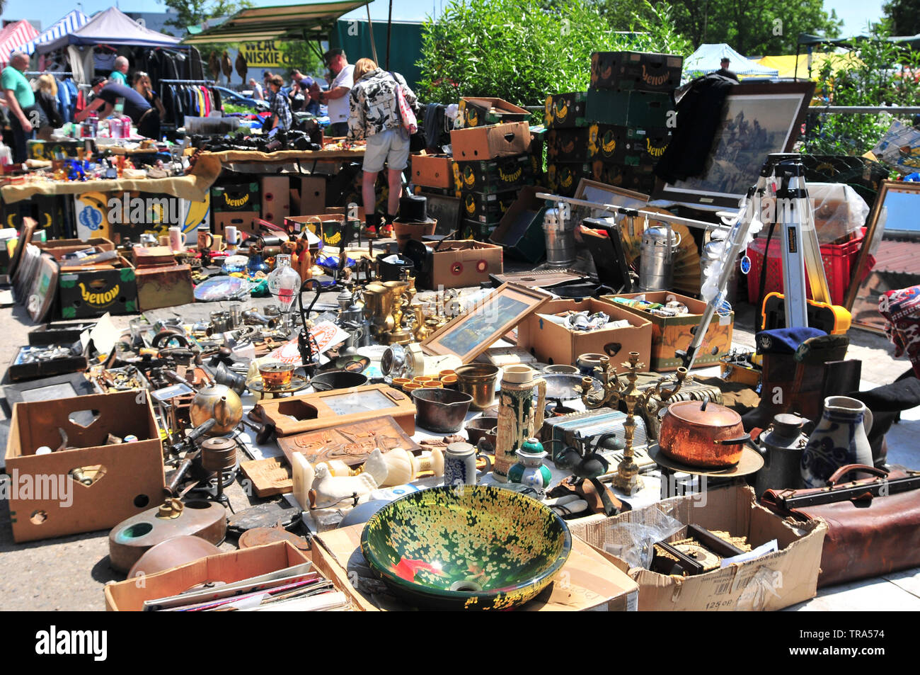 Wroclaw, Poland, May 2019. Vendor waiting for buyers. He is selling used/old decorative dishes at Wroclaw Flea Market Sułkowice Mill. Stock Photo
