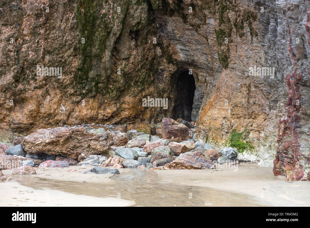 Entrance to cave inlet on Perranforth beach, Cornwall Stock Photo