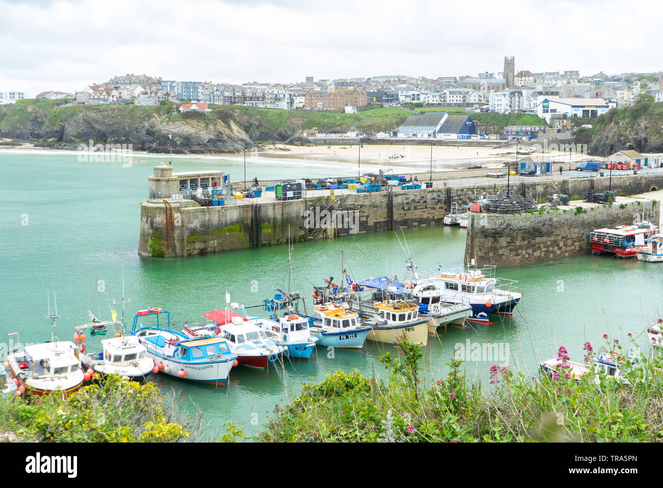 Fishing boats moored in Newquay harbour, Cornwall, UK Stock Photo