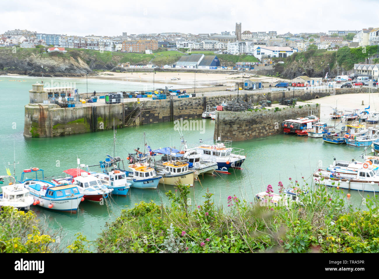 Fishing boats moored in Newquay harbour, Cornwall, UK Stock Photo
