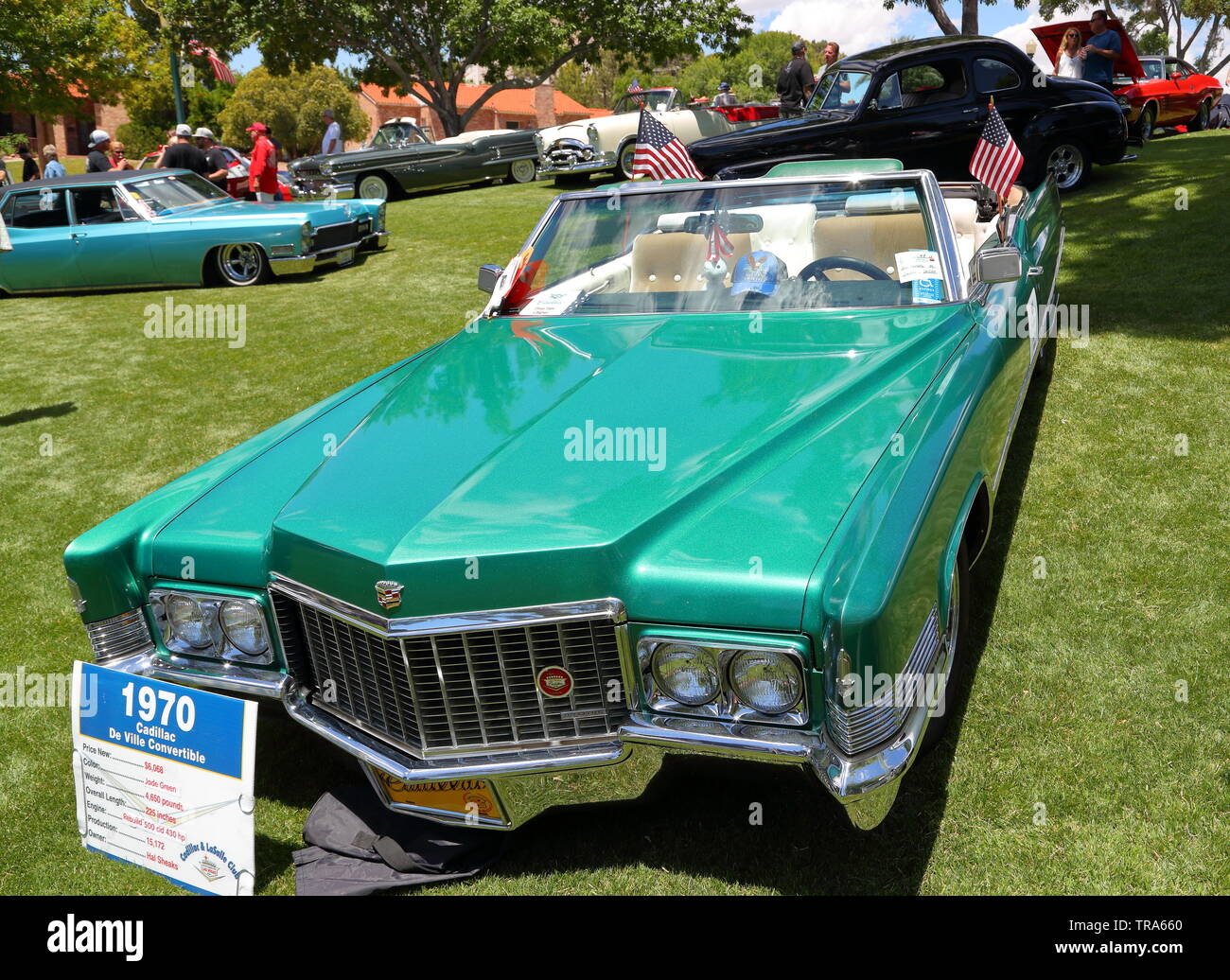 A green 1970 Cadillac De Ville Convertible amongst vintage vehicles and Hot Rods at a memorial day event at Boulder City, Nevada, USA Stock Photo