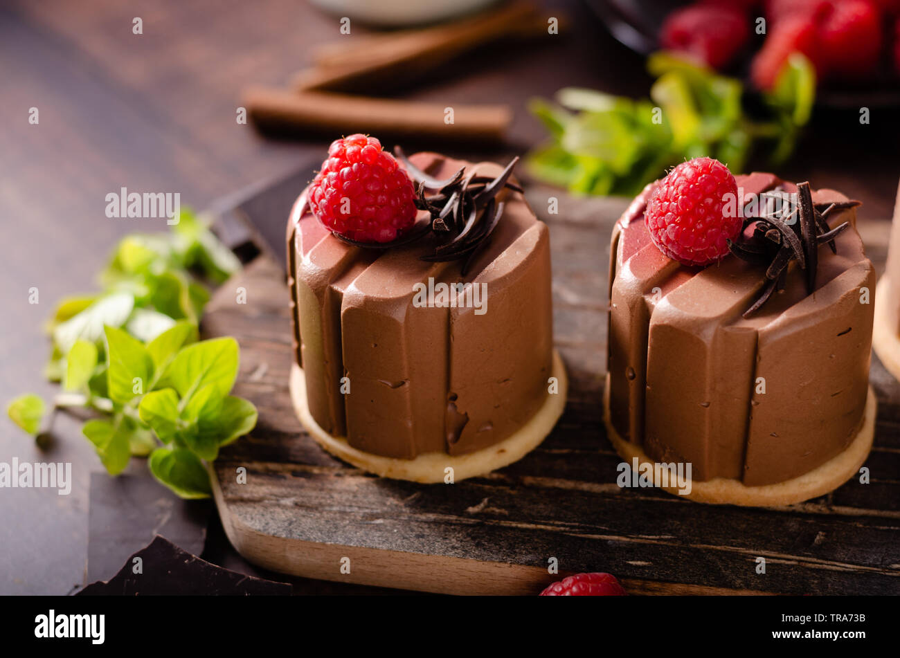 Delicious dessert with dark chocolate and fresh raspberry inside Stock ...