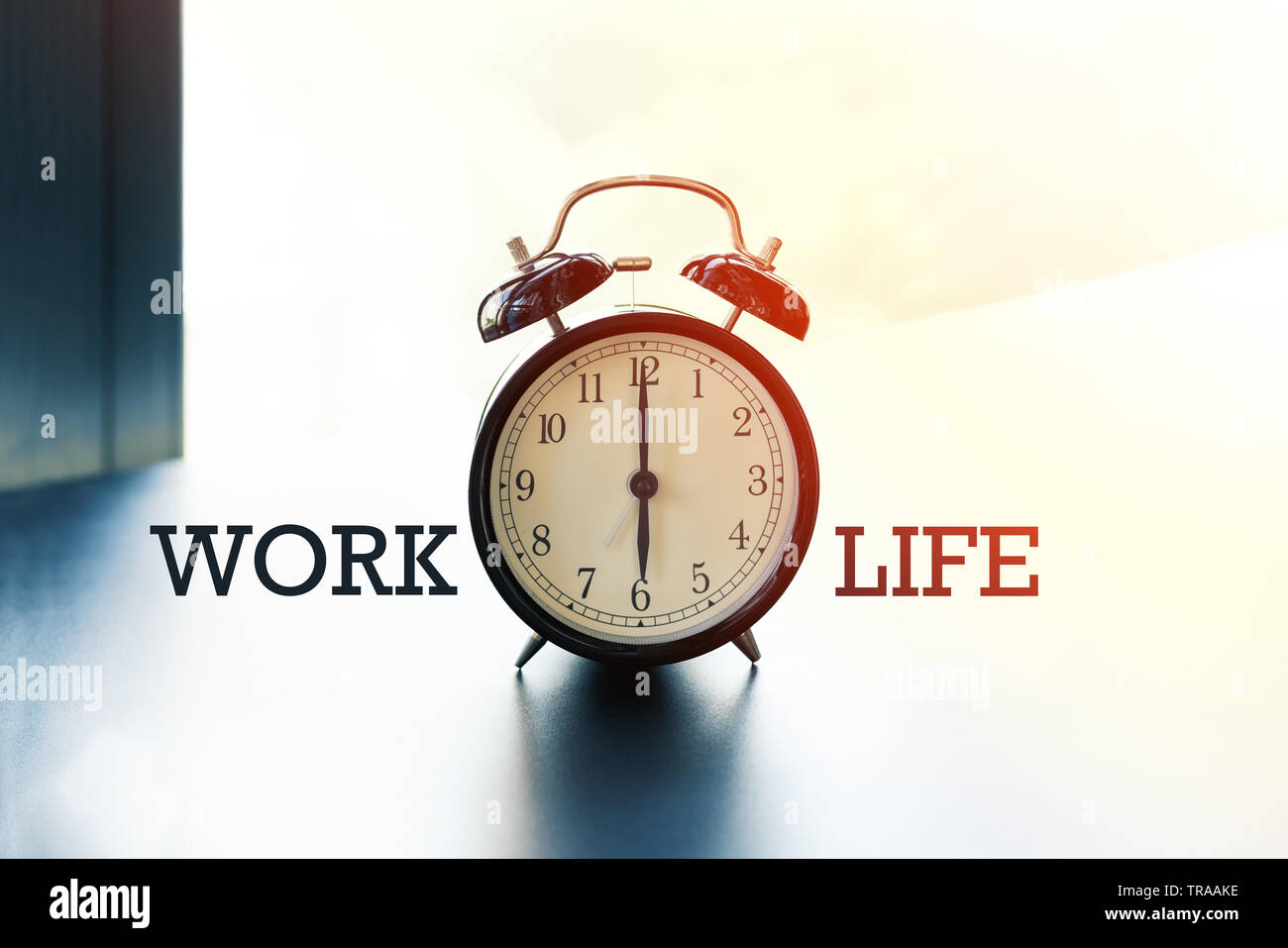 work life balance concept, alarm clock with word Work and Life Stock ...
