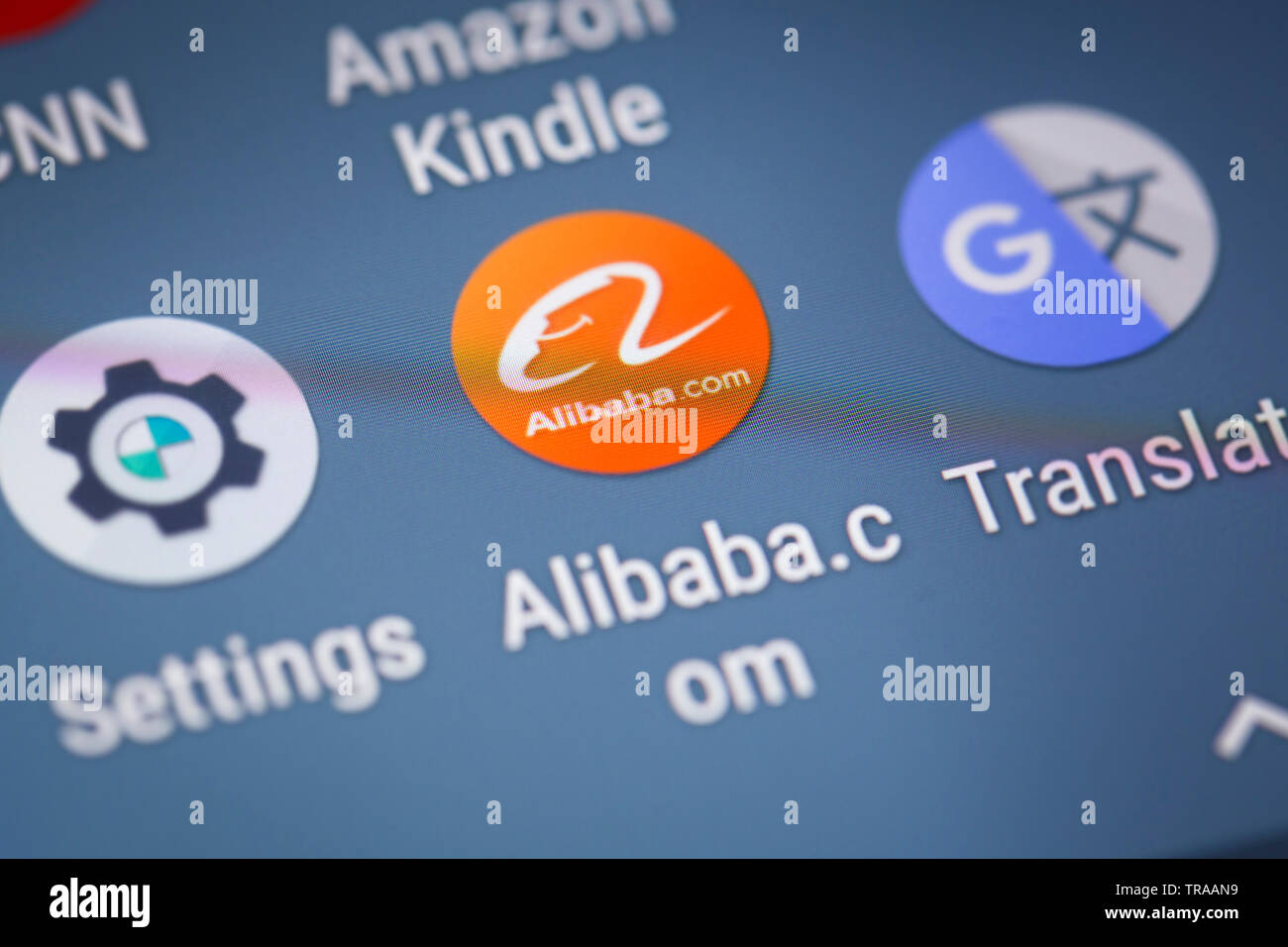 Alibaba.com logo icon on mobile phone screen Stock Photo