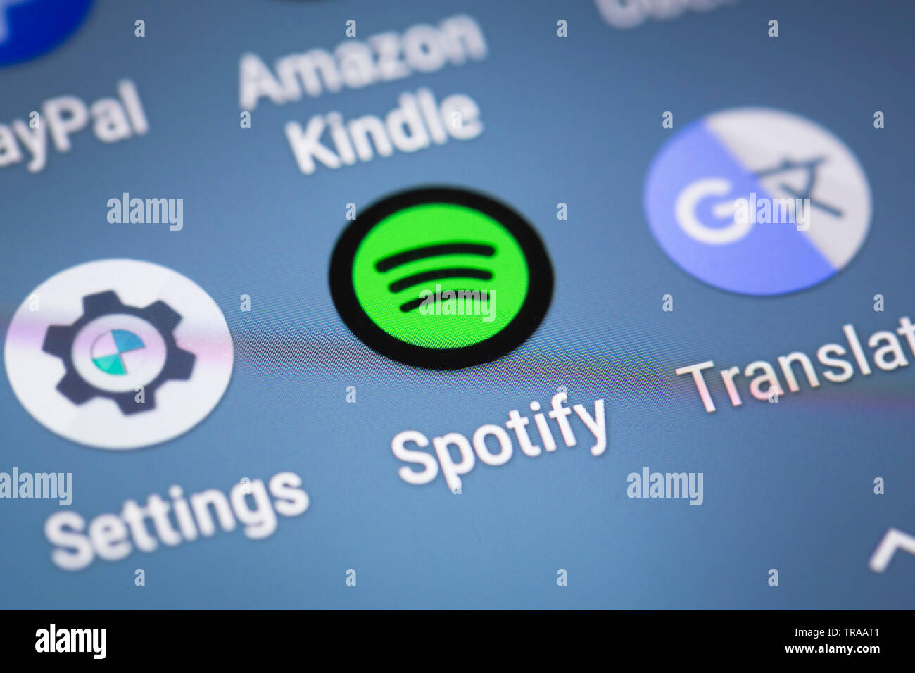 Spotify logo icon on mobile phone screen Stock Photo