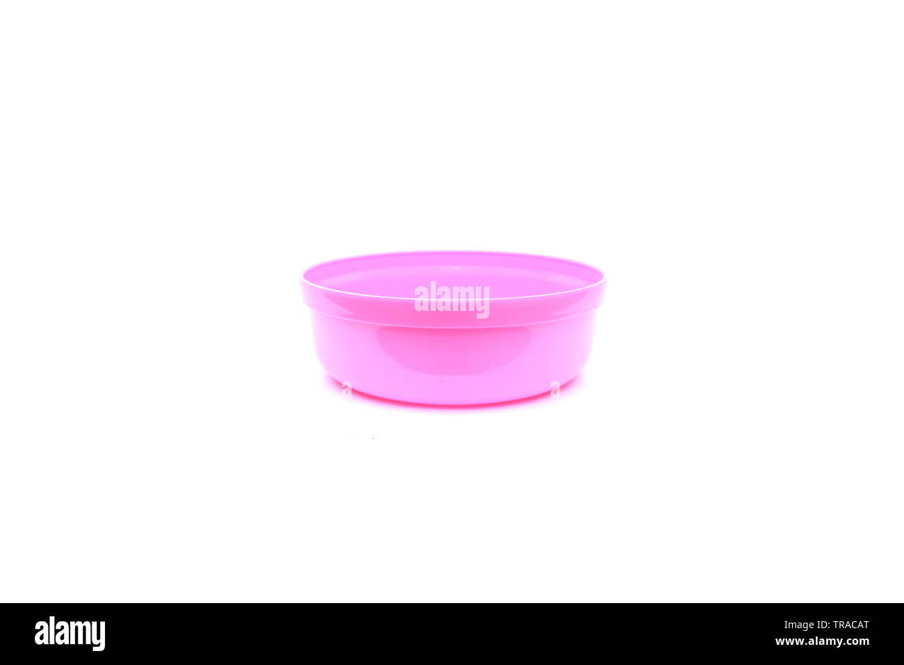 Pink plastic bowl on isolated Stock Photo