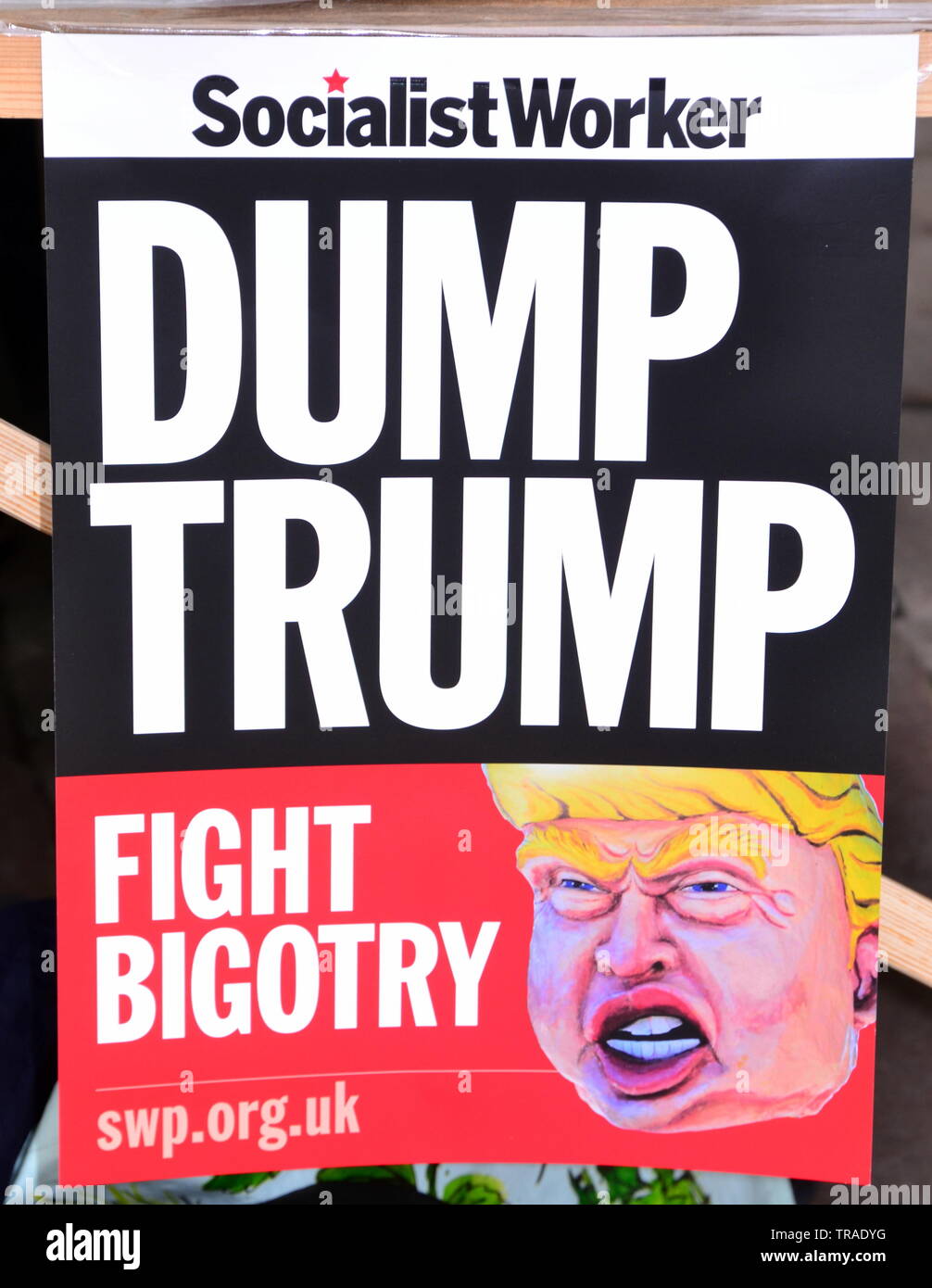 A Socialist Worker Party poster says 'Dump Trump' in city centre Manchester, uk, in the run up to President Trump's State visit to the uk Stock Photo