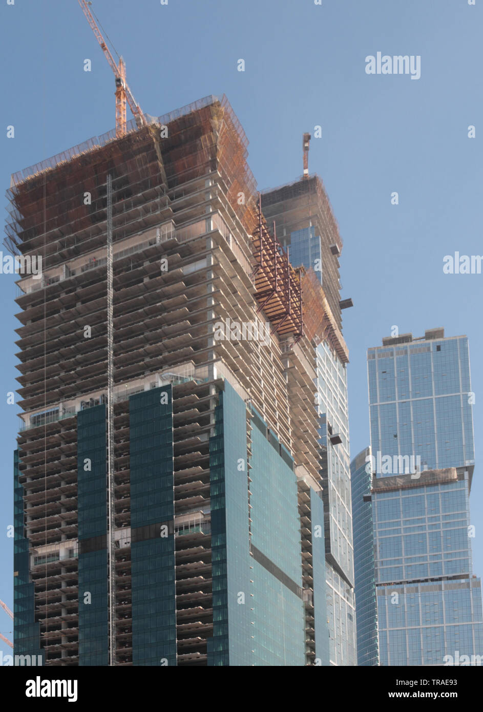 skyscraper develop on sky background at day Stock Photo - Alamy