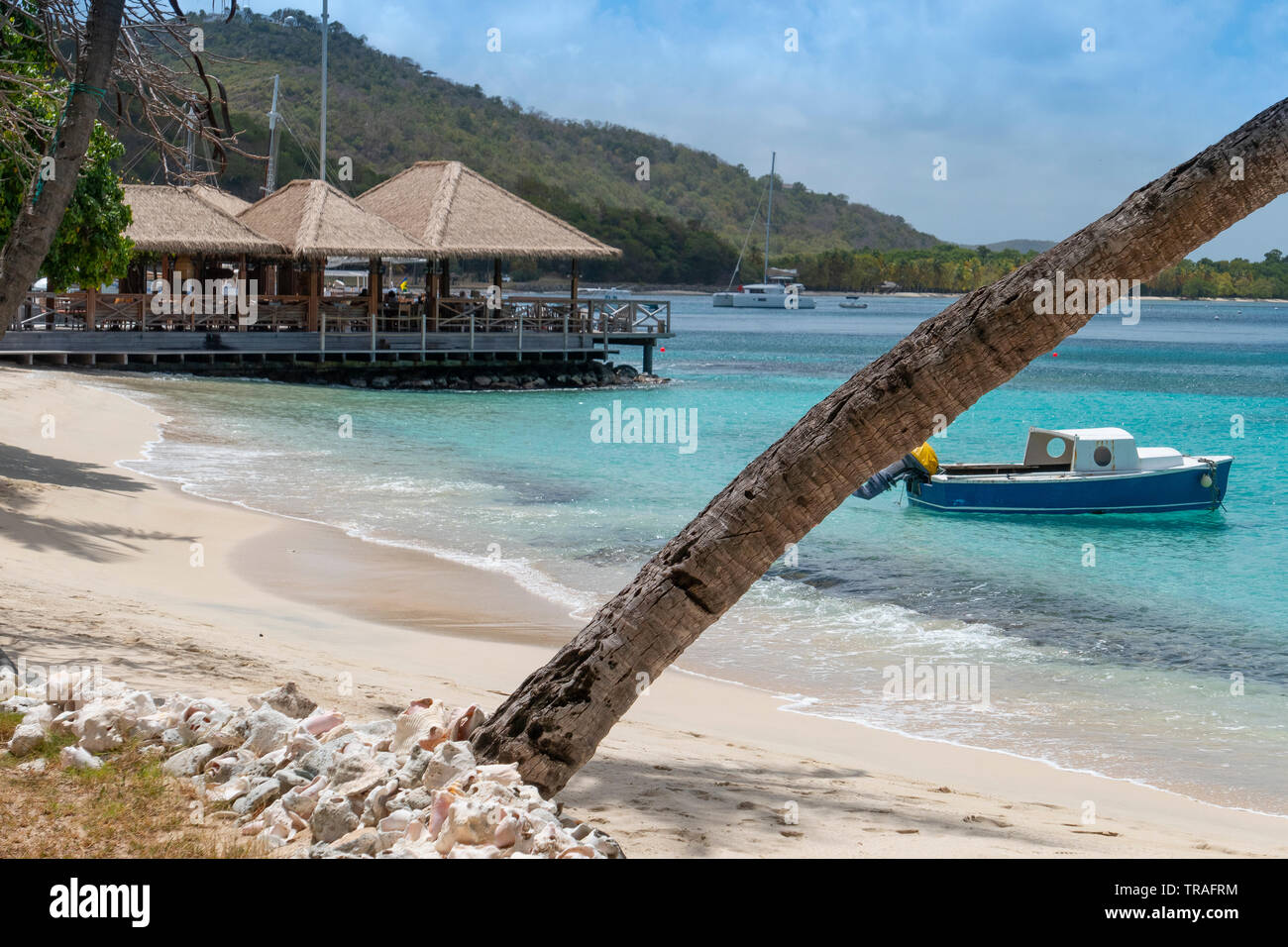 Lovell village on the beachfront on mustique hires stock photography