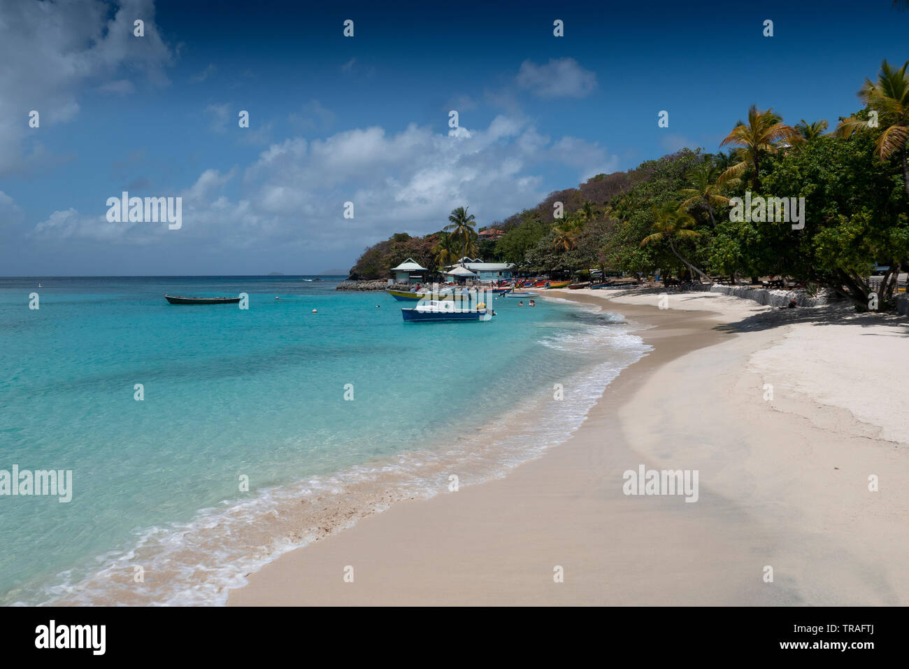 Lovell village on the beachfront on mustique hires stock photography