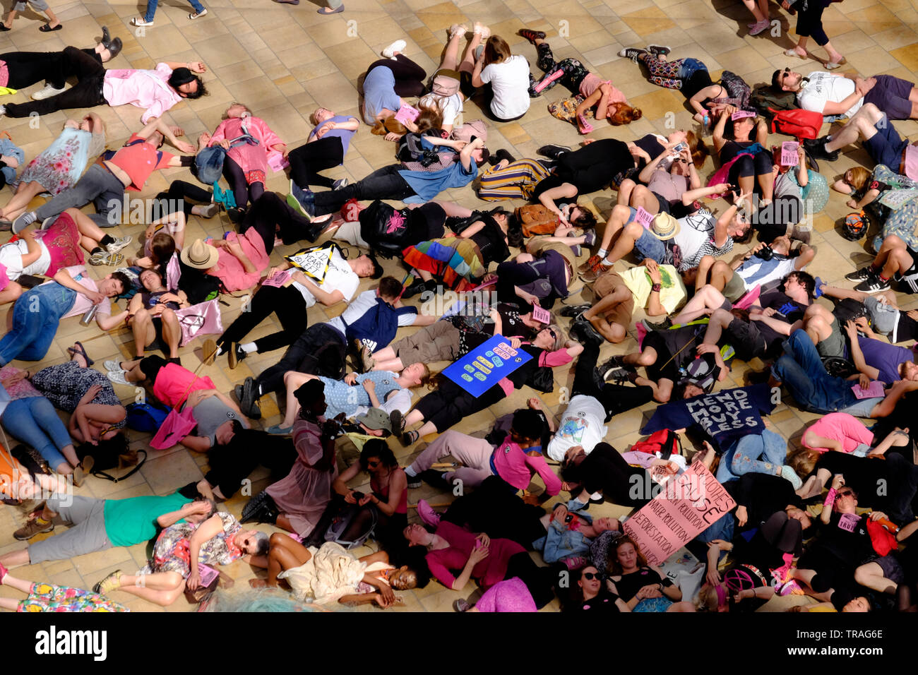 Bristol, UK, 1st June 2019. Campaigners from Extinction Rebellion are disrupting the Bristol shopping areas of Broadmead and Cabot circus to highlight the impact disposable fashion makes upon the environment. The campaigners are encouraging people to buy no new clothes for a year.  Credit: Mr Standfast/Alamy Live News Stock Photo