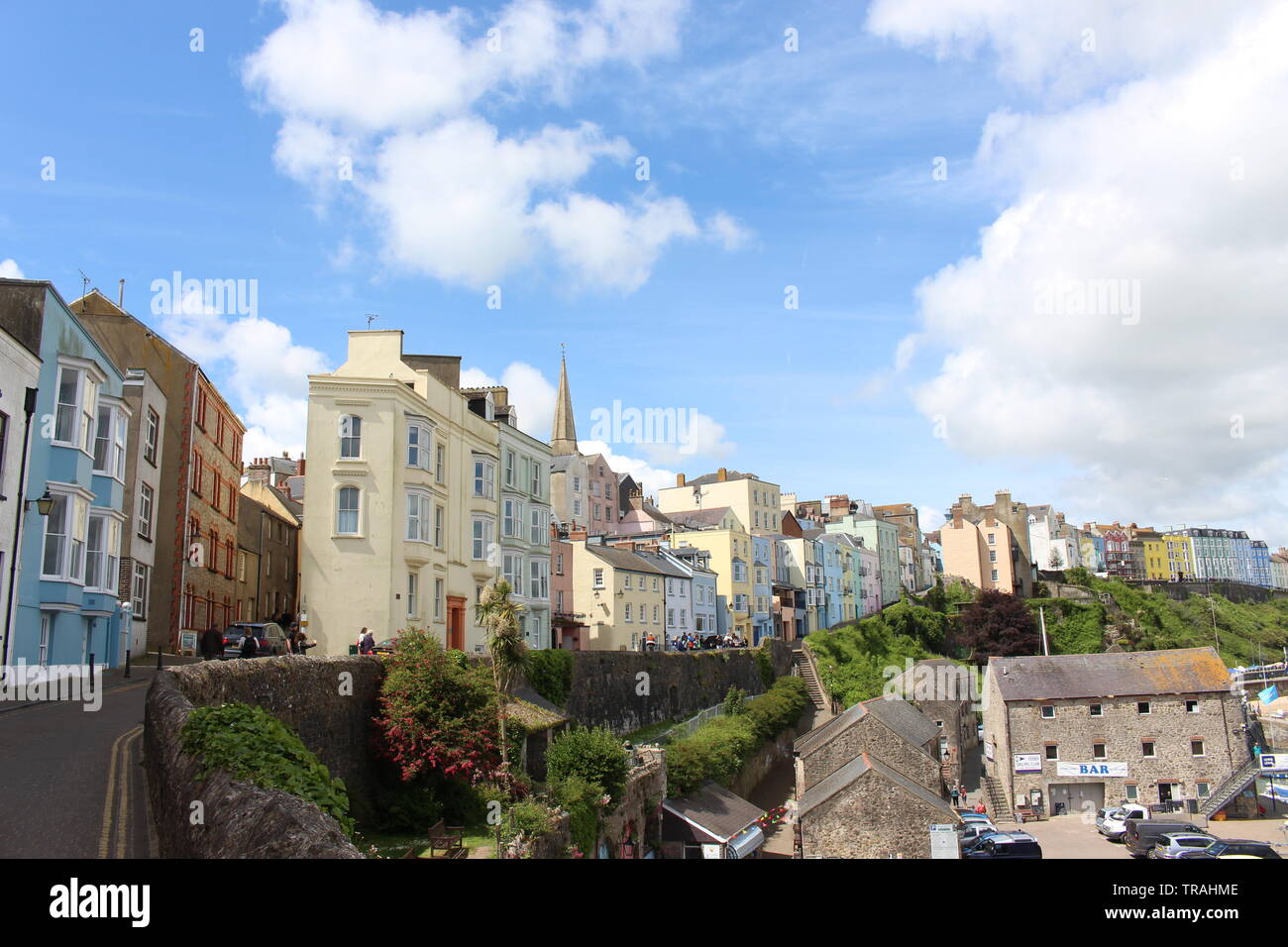 A photograph of colourful homes and buildings of Tenby, Pembrokeshire, Wales. Coastal life, fishing industry. Pembrokeshire holiday destination. Stock Photo