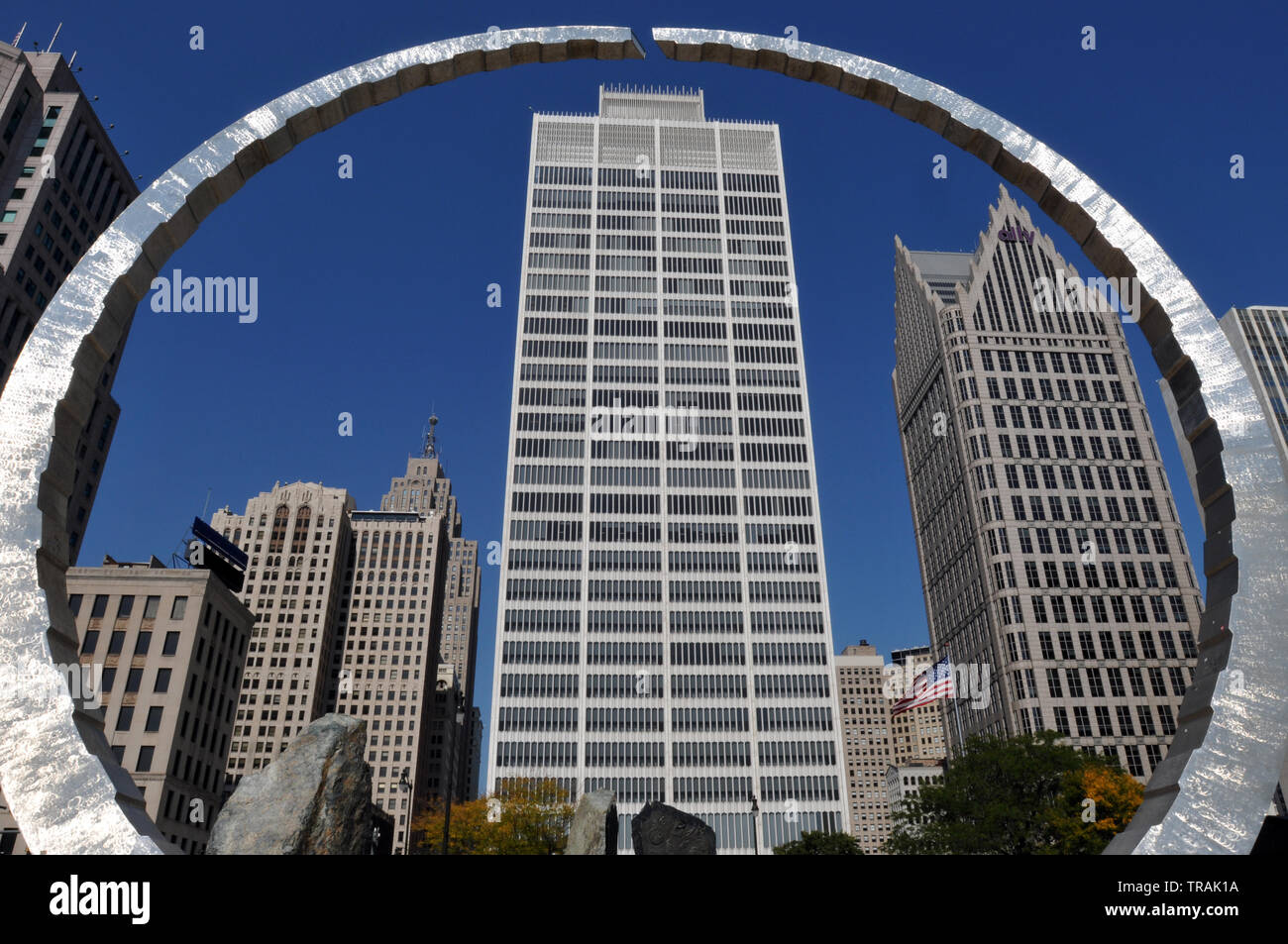 The Detroit, Michigan skyline is framed by Transcending, a sculpture in the riverfront Hart Plaza commissioned as a monument to the labor movement. Stock Photo