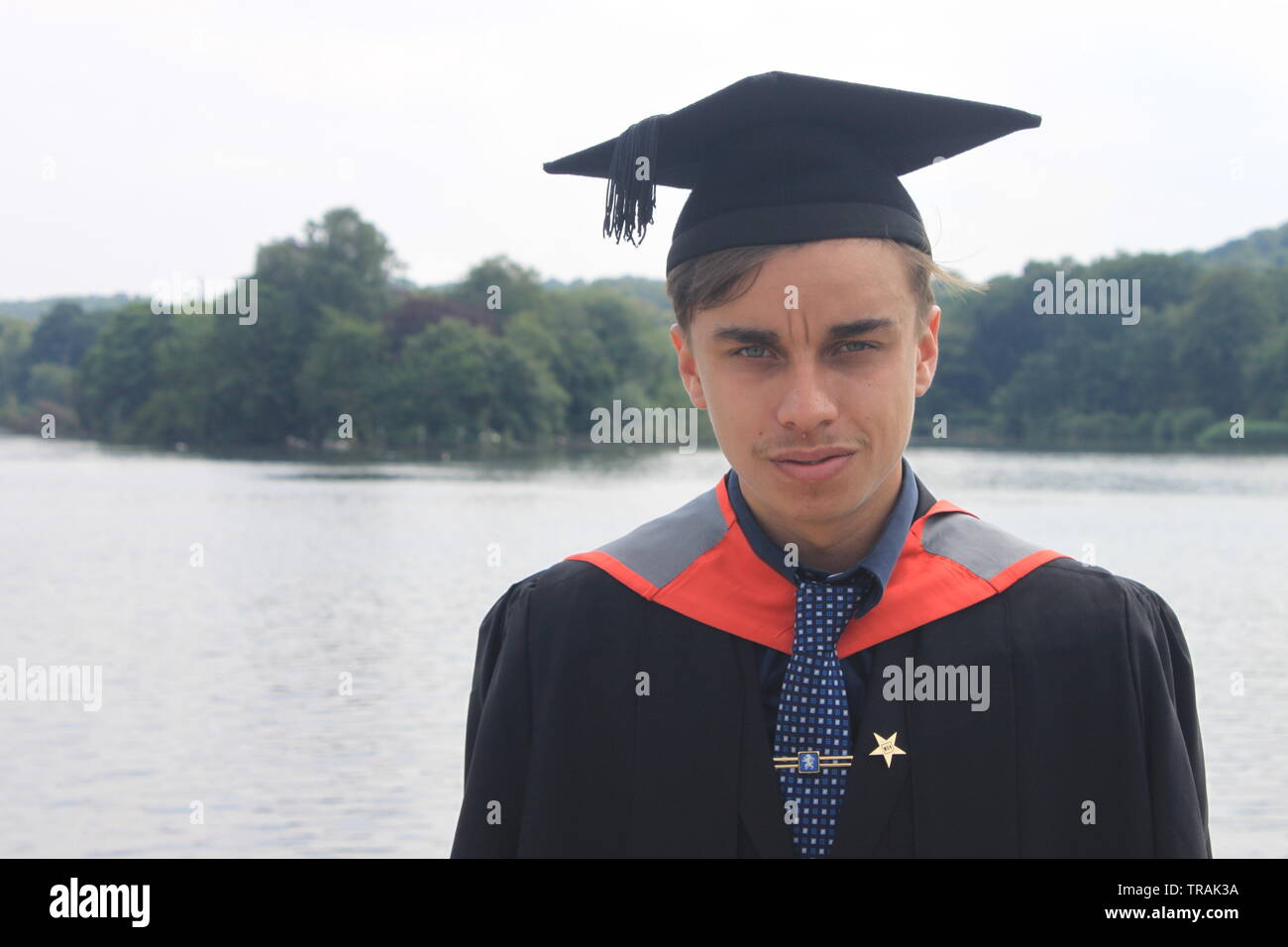 Young male Staffordshire University graduate at Trentham Gardens, Stoke-on-Trent Stock Photo