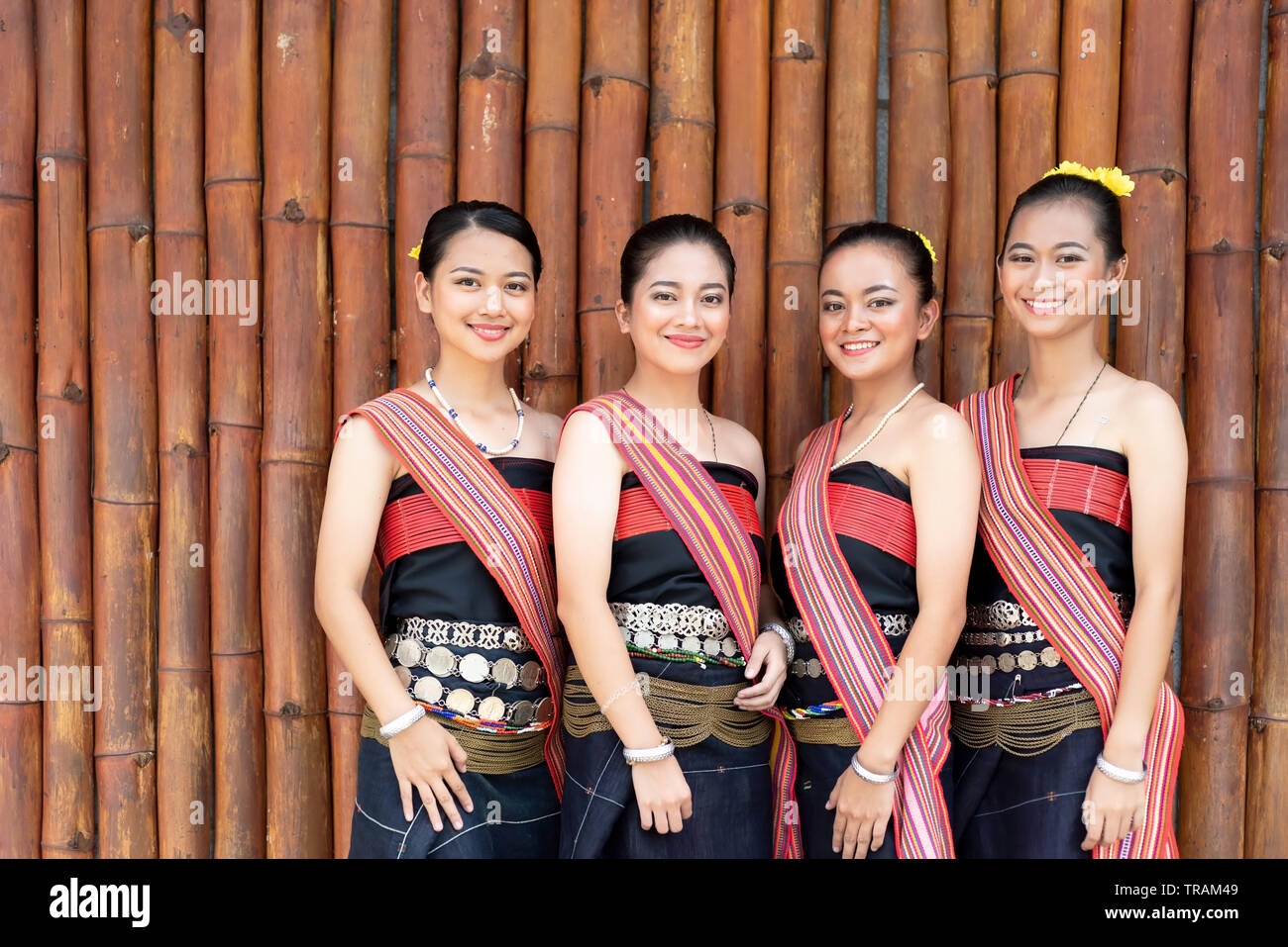 Group portrait of Kadazan Dusun young girls in traditional attire from Kota Belud district during state level Harvest Festival in KDCA, Kota Kinabalu, Stock Photo