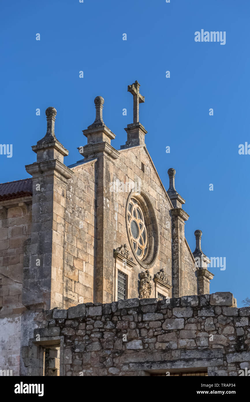 Tarouca / Portugal - 03 15 2018: View of historic building in ruins, convent of St. Joao of Tarouca, front facade detail of Romanesque church Stock Photo