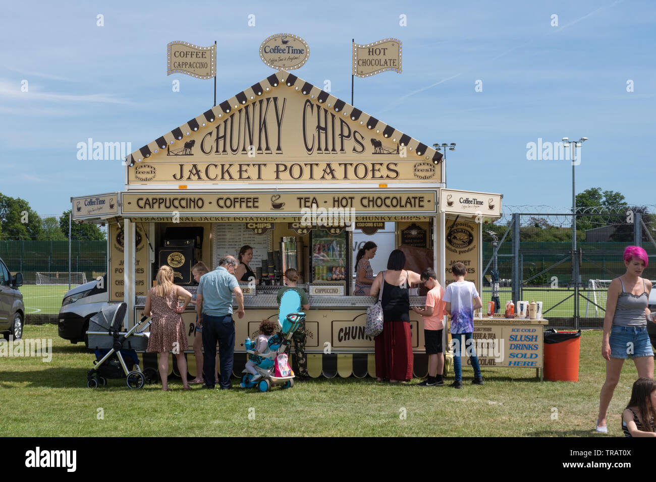 Food and drink stall  (refreshment stand) selling jacket potatoes, chips and drinks at a show (Basingstoke Kite Festival), an event in Basingstoke, UK Stock Photo