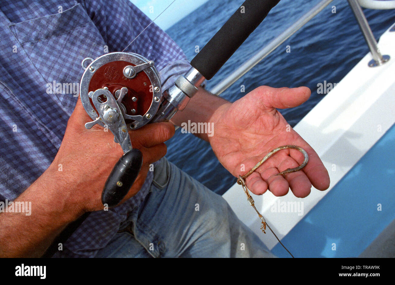 Shark fishing with rod and line off Plymouth, Devon, England Stock