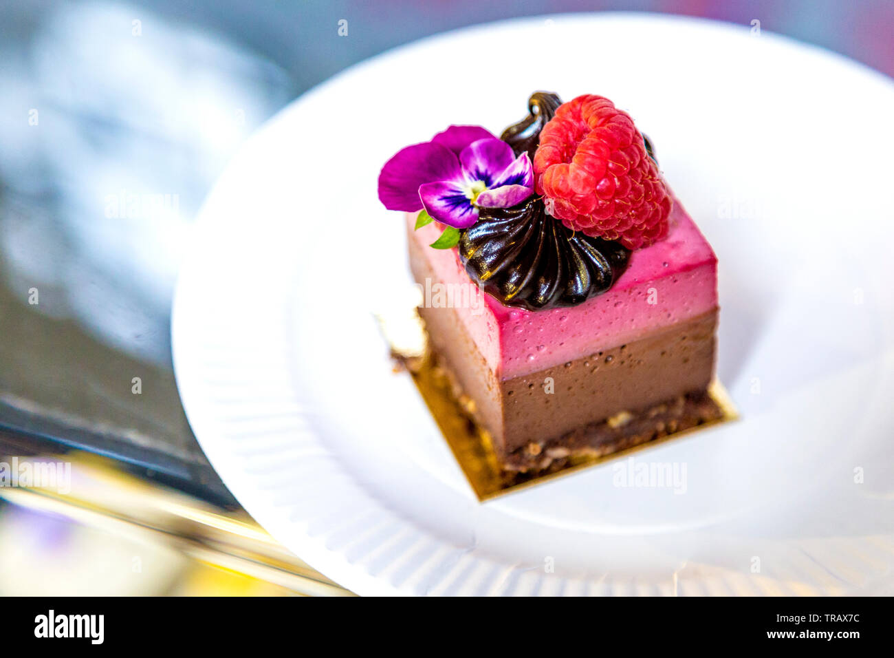 27th May 2019 Free From Festival at The Boiler House, raw vegan raspberry and chocolate cake (Ve Raw Nika's), London, UK Stock Photo