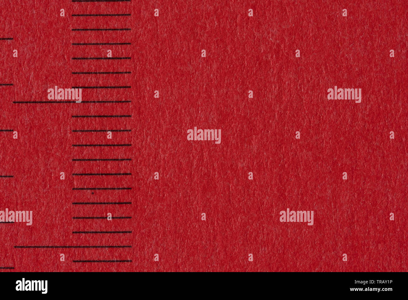 Macro image of red card with measurement lines Stock Photo