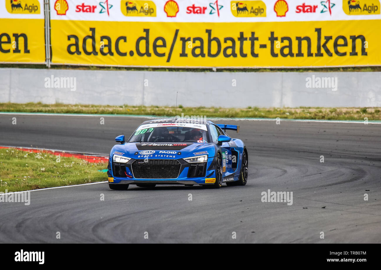 Oschersleben, Germany, April 27, 2019: Audi R8 LMS GT4 by Racing One driven by Patricija Stalidzane during ADAC GT4 at the Motorsport Arena. Stock Photo