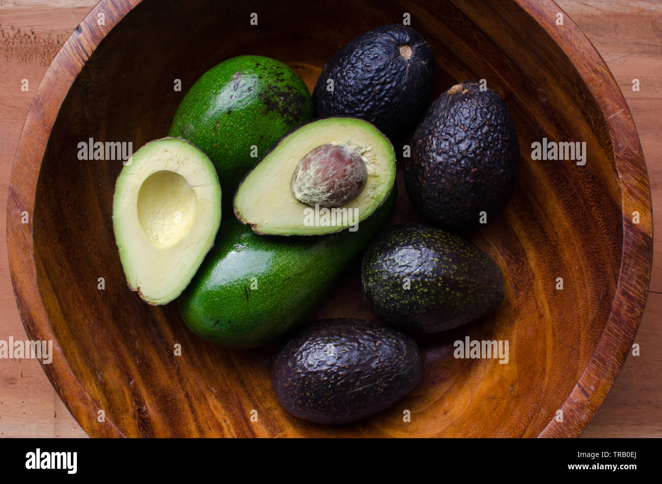 Avocados in a bowl Stock Photo