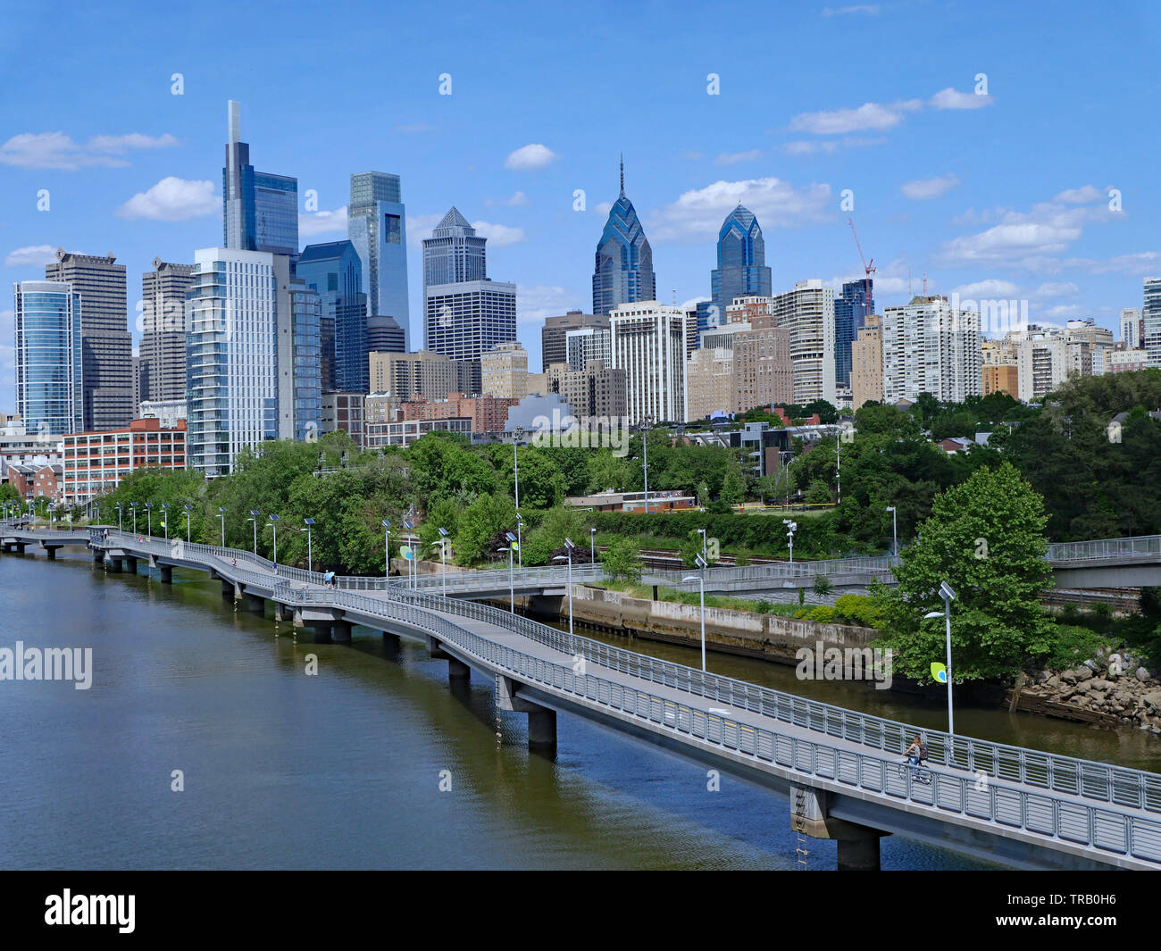 Philadelphia skyline in 2019 with recreational boardwalk along the Schuylkill River, known as the Schuylkill Banks Stock Photo