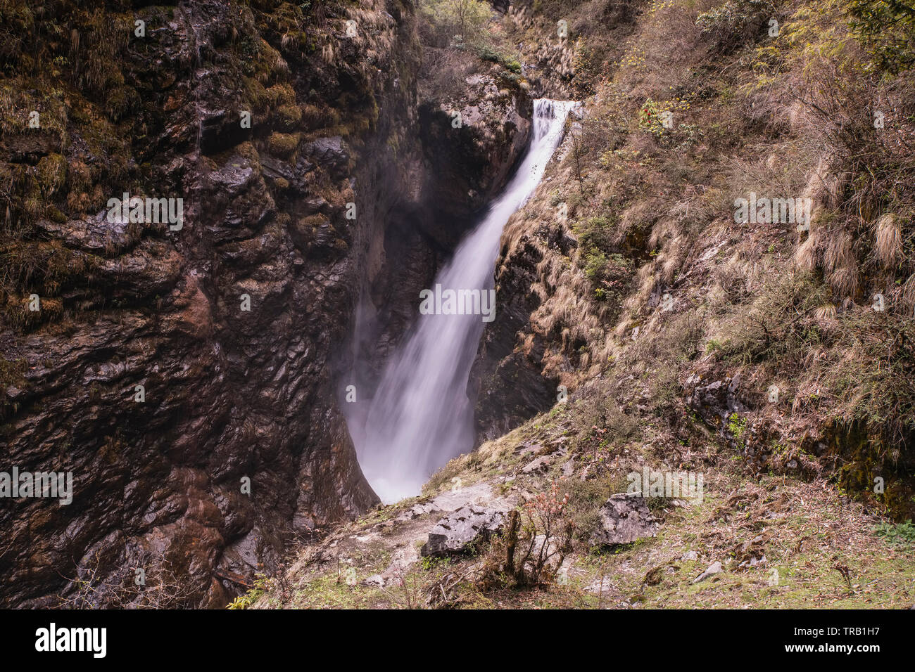 Waterfall,entrance to Lachen,valley,passing,through,deep ,gorge,North Sikkim, India. Stock Photo