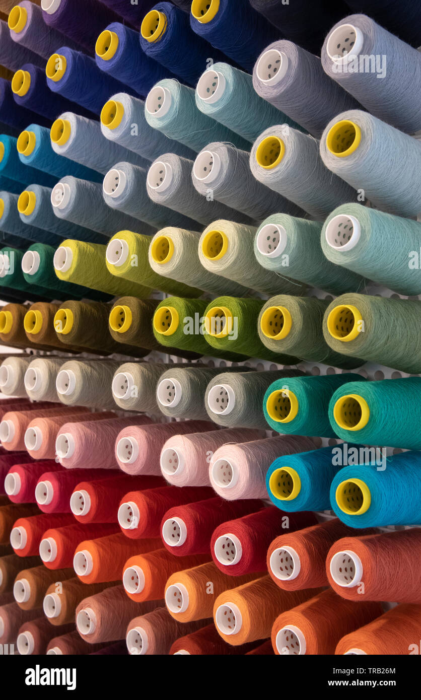 Coloured yarn reels Stock Photo
