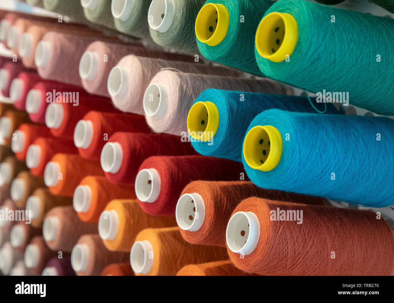 Coloured yarn reels Stock Photo
