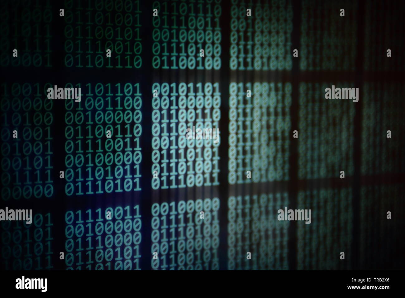 looming data. overhead plane led panel displaying pale blue green binary code data on black background. digital information and internet cloud drive c Stock Photo