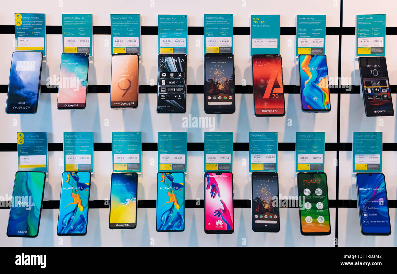 Rows of new smart phones on display in EE mobile phone shop Stock Photo