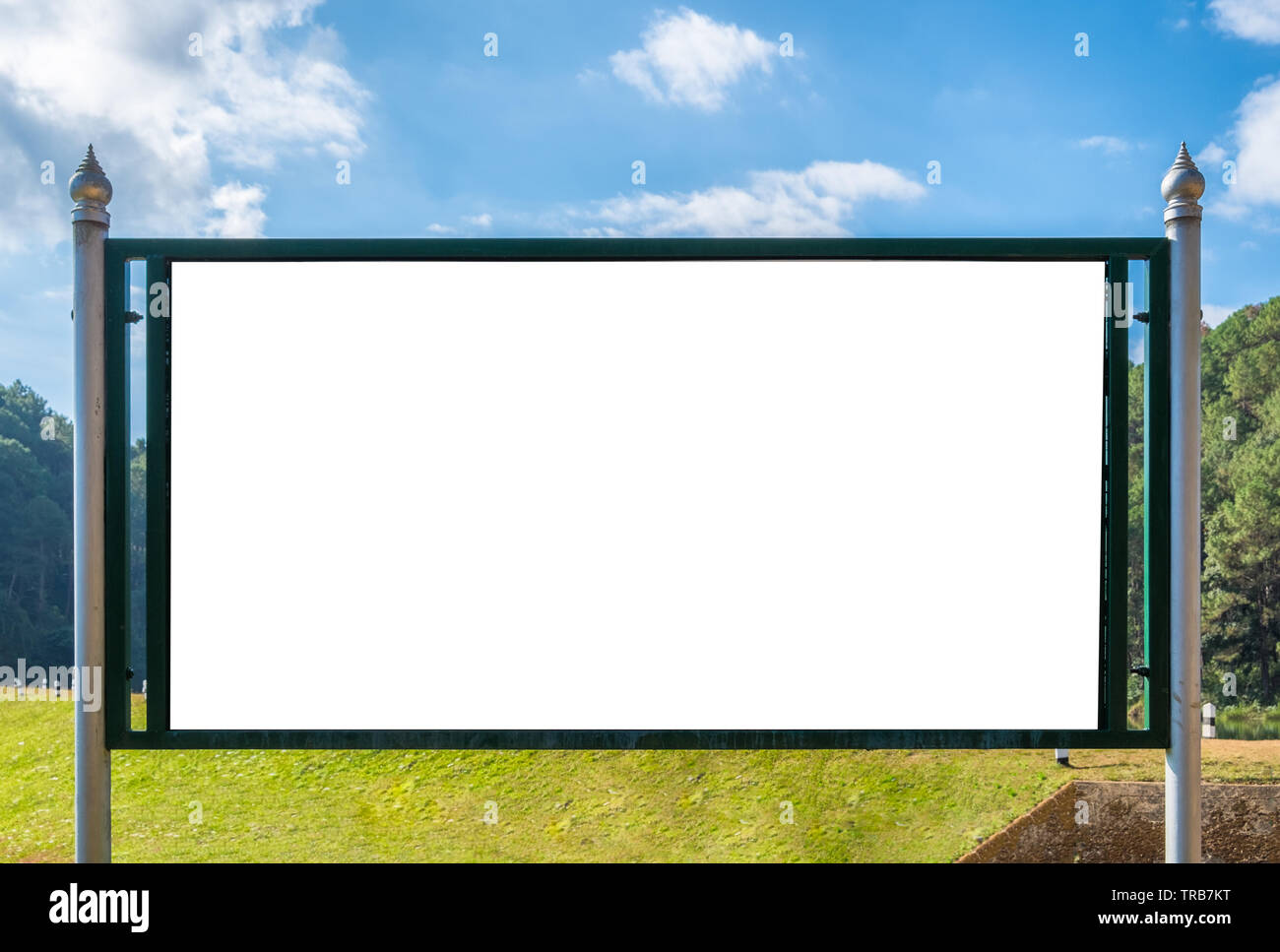 Large signboard white blank on green lawn Stock Photo - Alamy