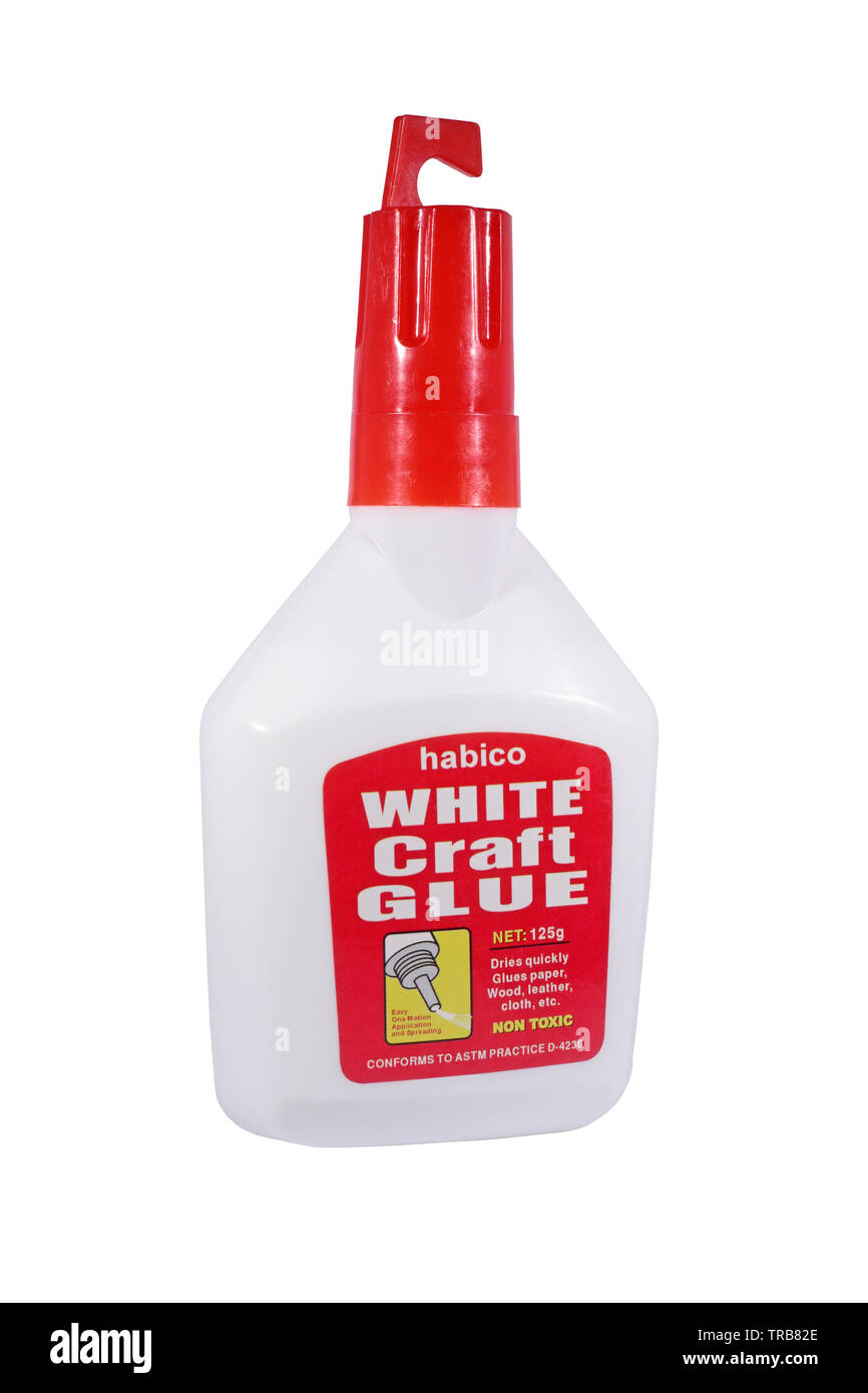 A bright red and white 125g bottle of habico white PVA craft glue isolated on a white background Stock Photo