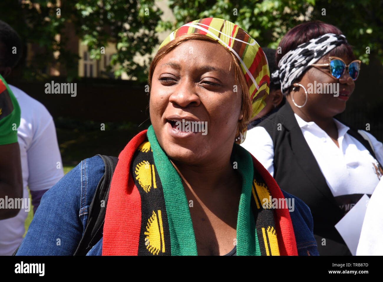 A Nigerian Woman sang at a protest in support of Freedom for Biafra, Houses of Parliament, Westminster, London. UK Stock Photo