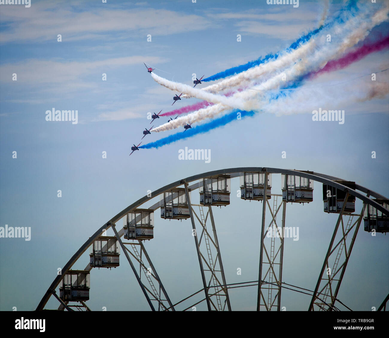 GB - DEVON: RAF Red Arrows Display Team at the Torbay Airshow flying over English Riviera Wheel at Torquay (31. May 2019) Stock Photo