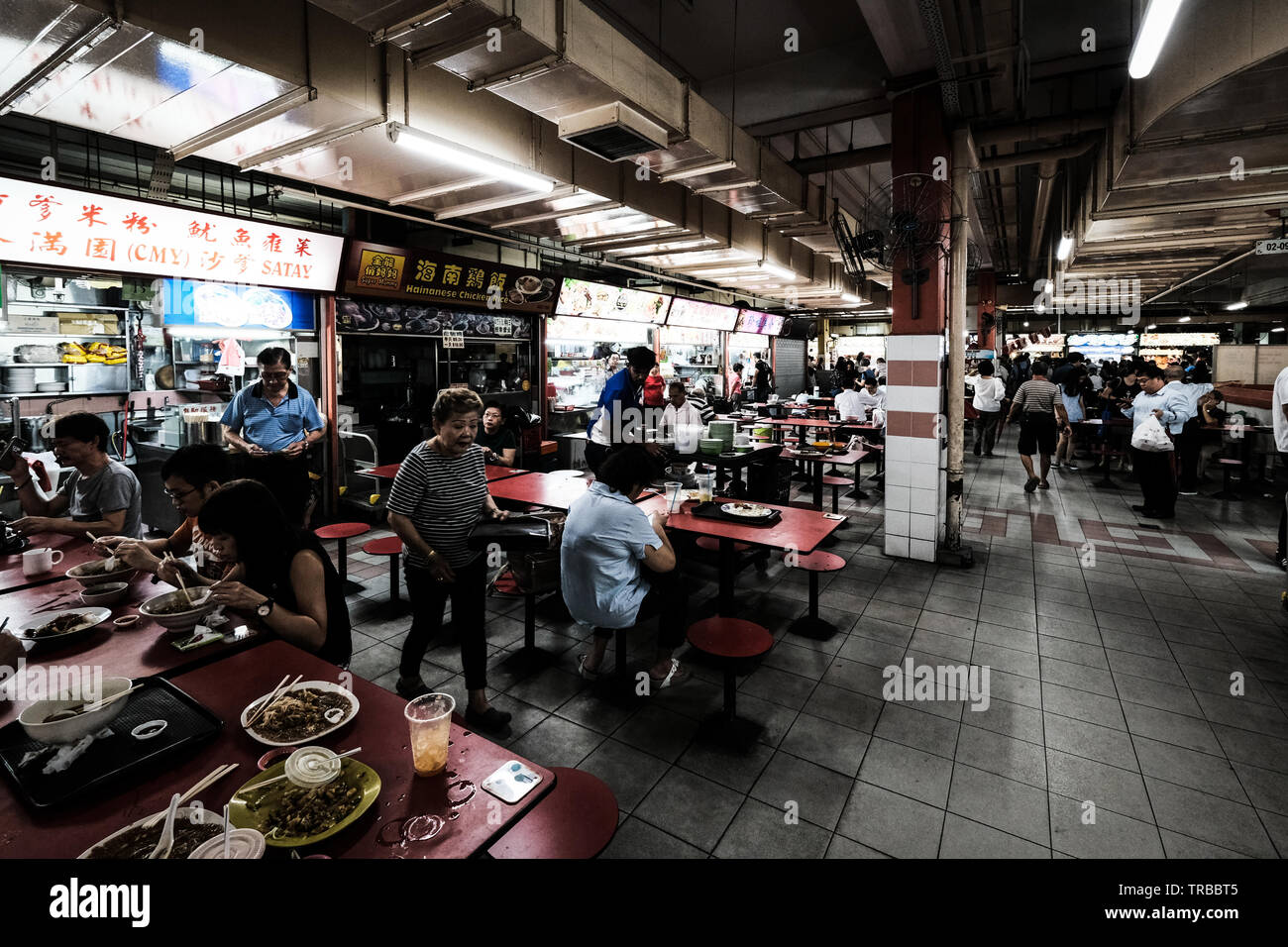 Locals Eating at Hawker Centre, Singapore Stock Photo