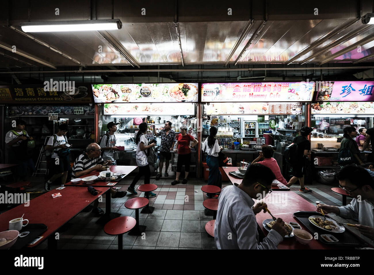 Locals Eating at Hawker Centre, Singapore Stock Photo