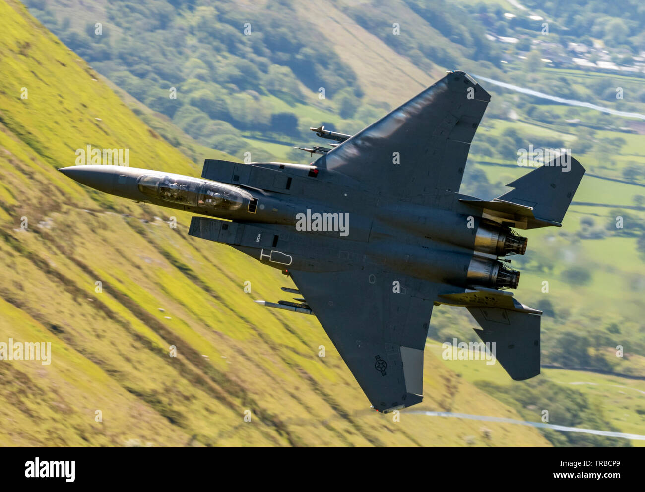 USAF F-15E Strike Eagle from the 48th/FW at RAF Lakenheath Flying Low Level in Wales Stock Photo