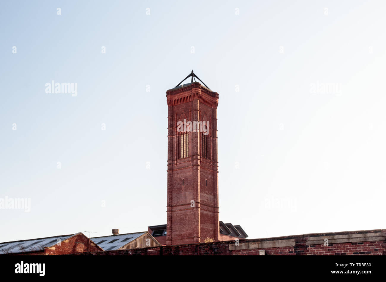 View of old industrial tower on Globe Road Stock Photo - Alamy