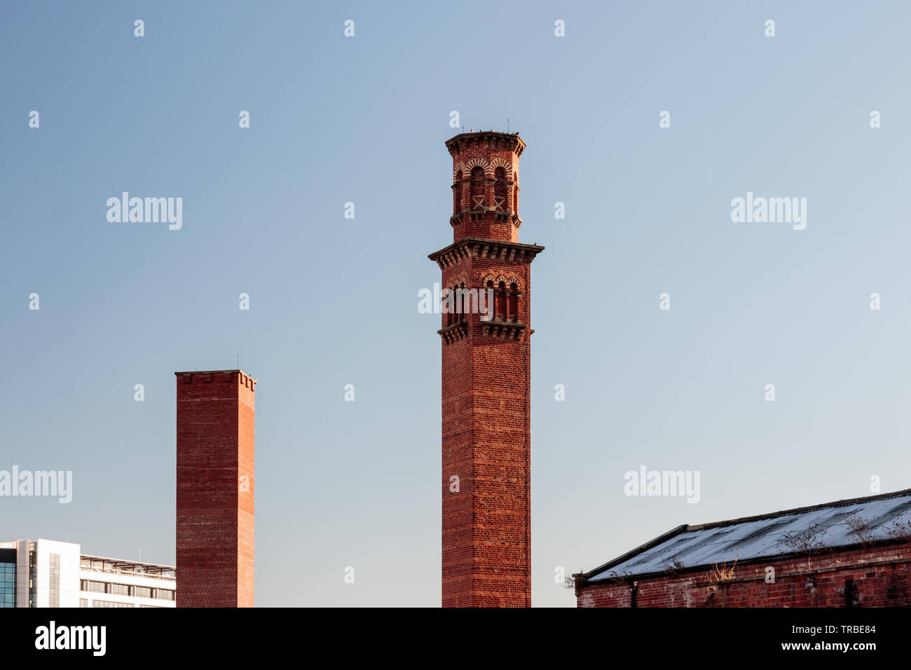 View of old industrial chimneys on Globe Road Stock Photo - Alamy