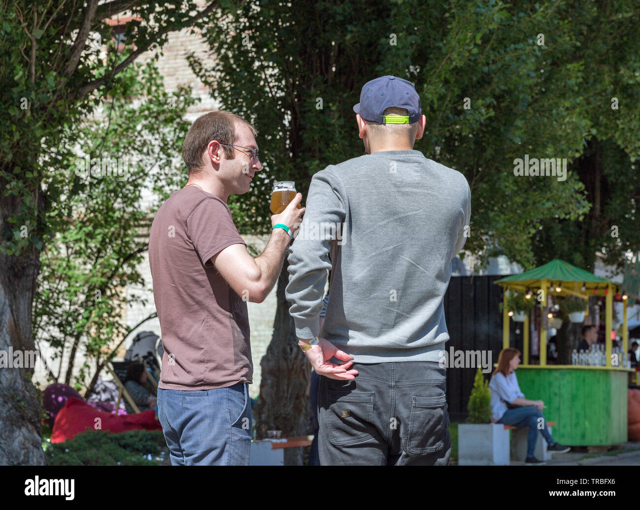 KYIV, UKRAINE - MAY 20, 2018: People visit craft Kyiv Beer Festival vol. 3 in Art Zavod Platforma. About 300 unique varieties of craft beer were prese Stock Photo