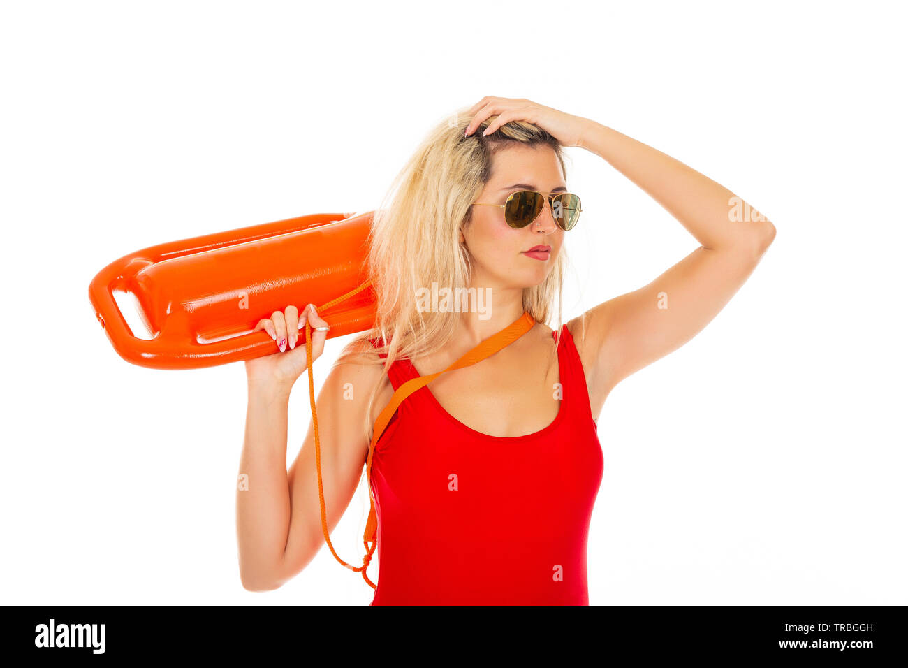 Pretty young blonde lifeguard in red sexy swimsuit with lifeguard rescue  can floating buoy tubeon the white background Concept Woman in Swimsuite  Stock Photo - Alamy