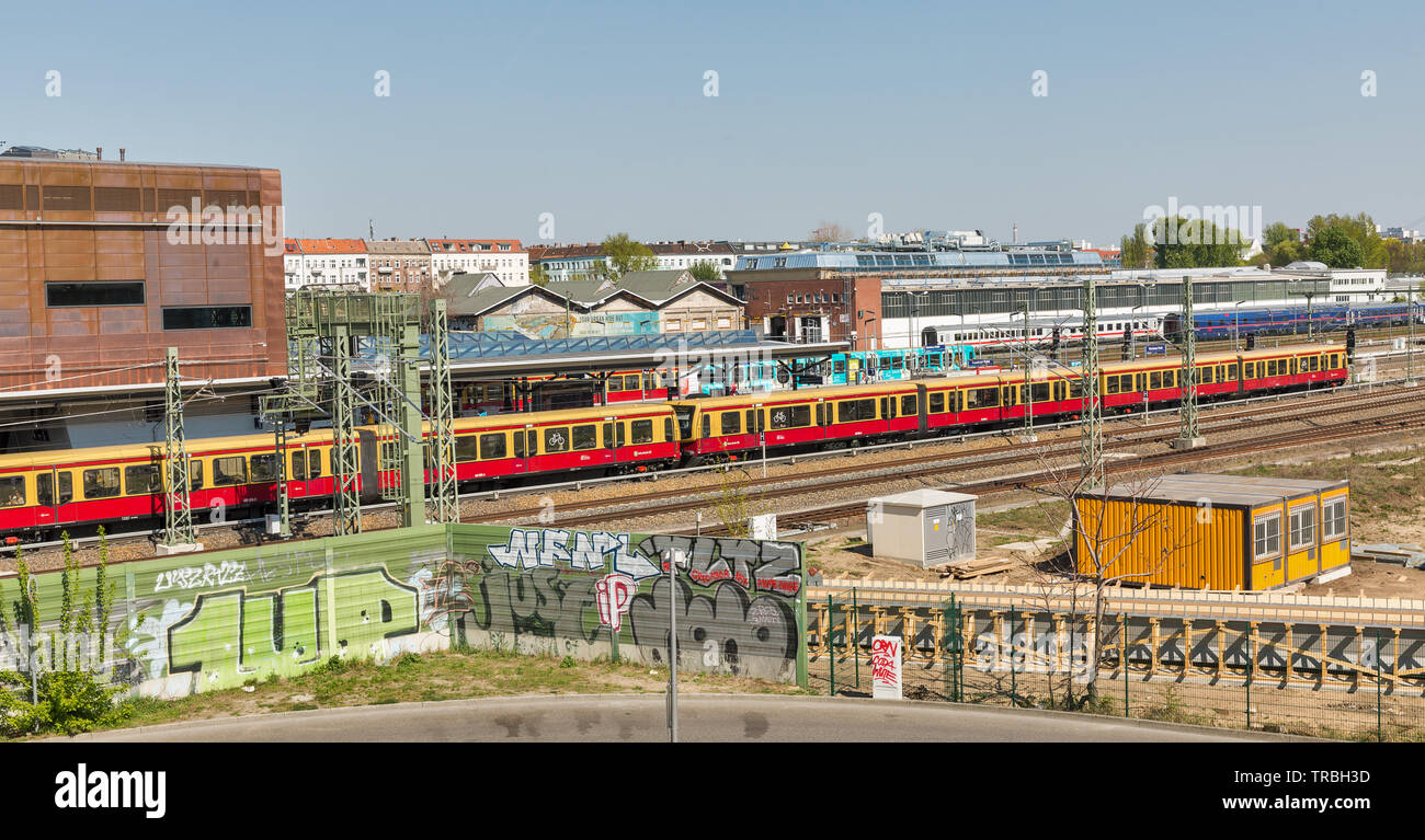 BERLIN, GERMANY - APRIL 18, 2019: Passengers trains wait on platforms of S-Bahn railway station Depot Warschauer Street. It is interchange node lines Stock Photo