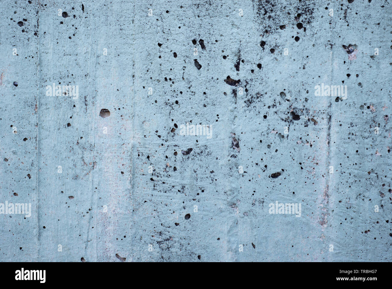 Light Blue Peeling Concrete Wall Stock Photo
