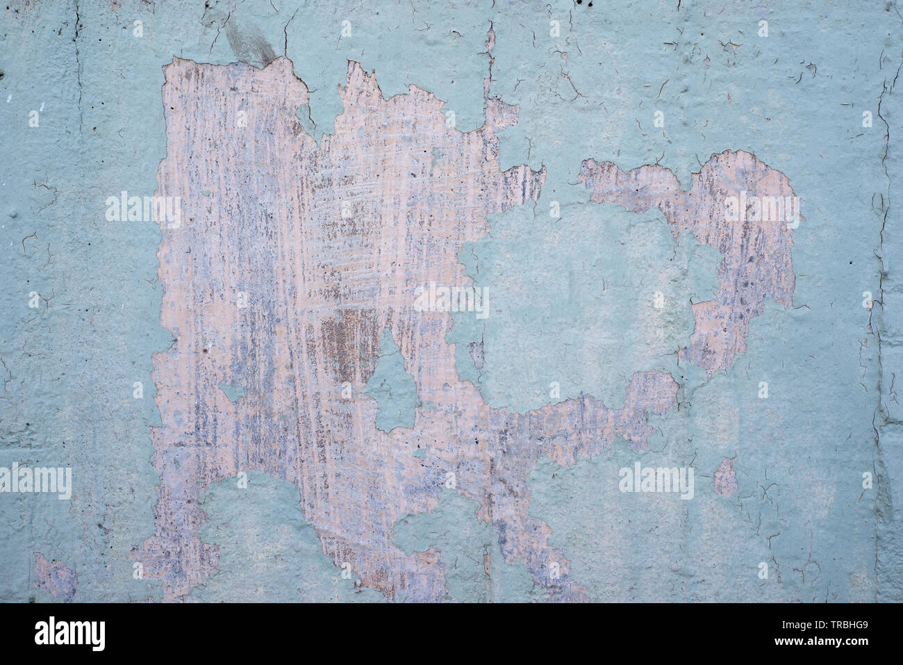Light Blue Peeling Concrete Wall Stock Photo