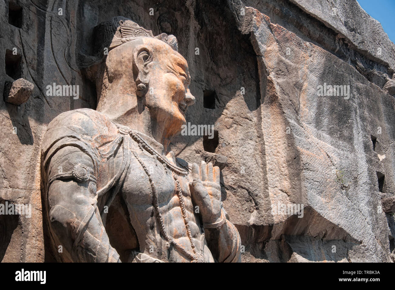 A large bodhisattvas stone statue Fengxiansi cave at Longmen grottoes in Luoyang China Henan province. Stock Photo